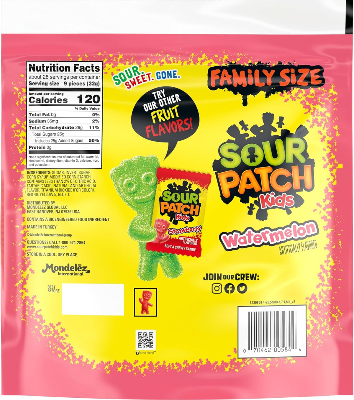 Watermelon slice-shaped pink and green gummy candies spilled out of a resealable bulk bag.