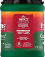 Freshly brewed decaf coffee cup next to Folgers canister