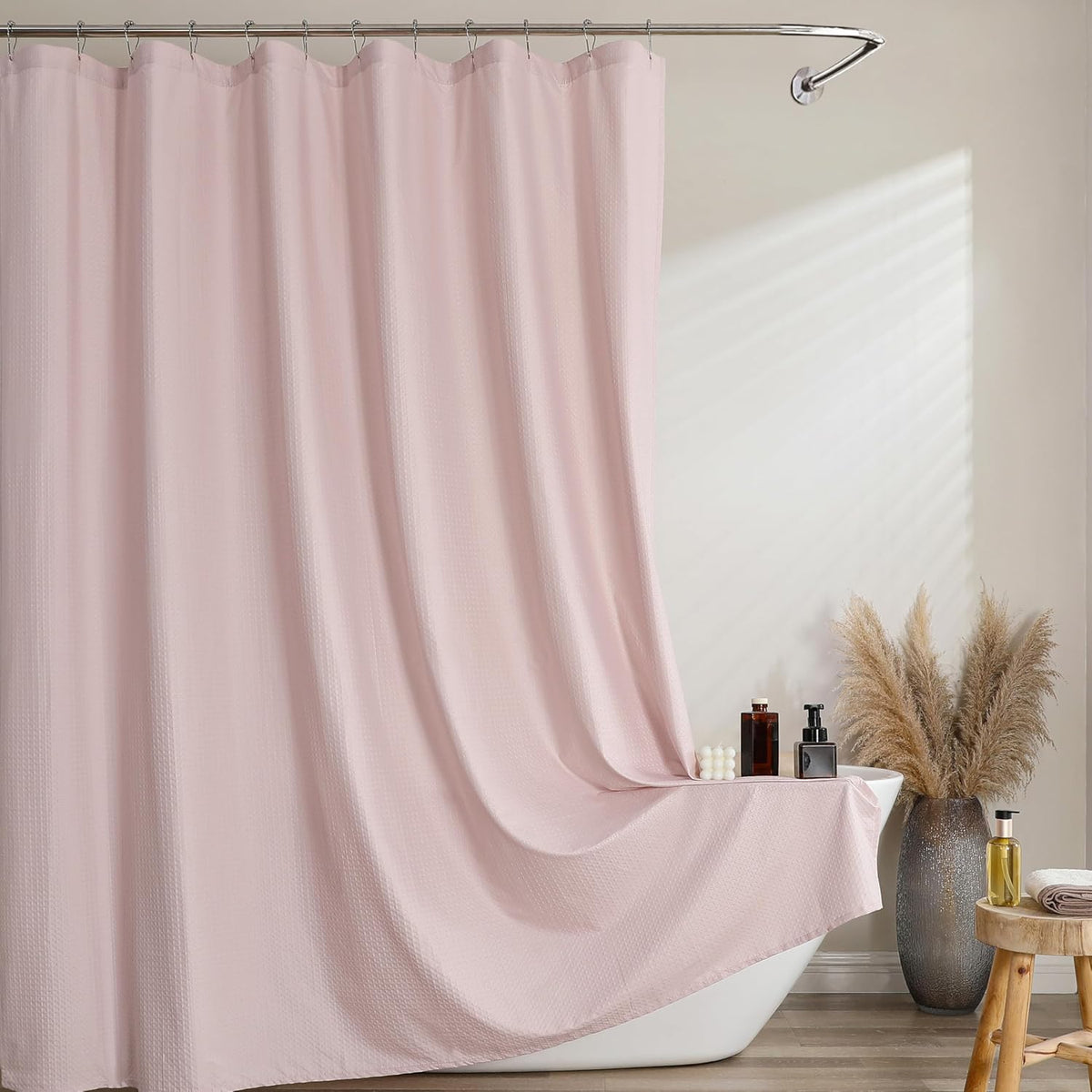 Ebesto pink waffle shower curtain front view hanging in a bright modern bathroom