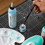 Angelus brush cleaner twist top cap design