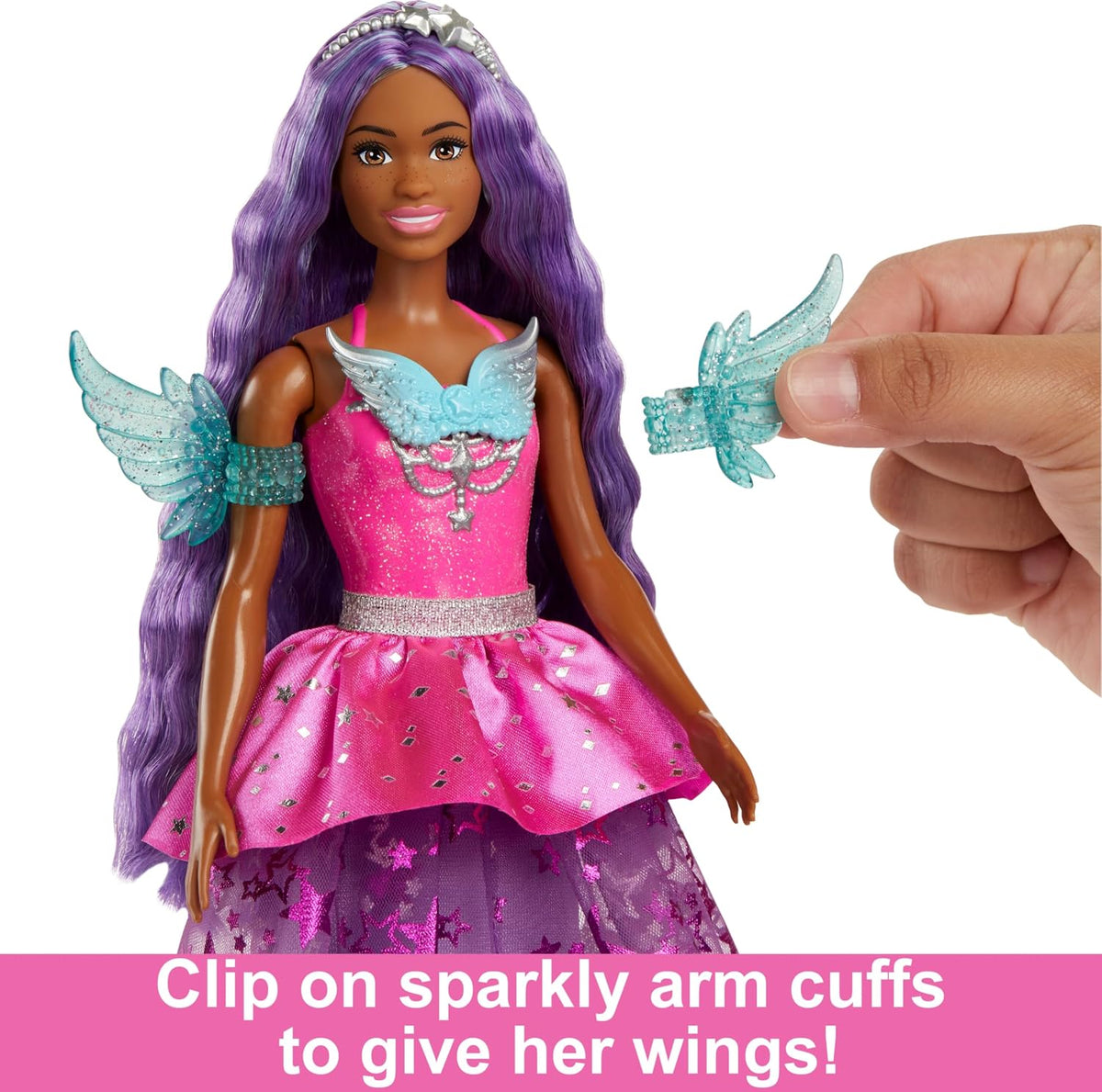 Close up of Barbie Brooklyn doll star pattern dress and wing arm cuffs