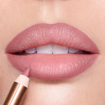 Close up of Charlotte Tilbury Pillow Talk Fair lip liner showcasing the fine tip for precise lip defining.