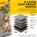 Glad jumbo size dog training pads spread out on a wooden floor
