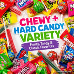 Assorted colorful candy mix spilled out showcasing different sweet varieties