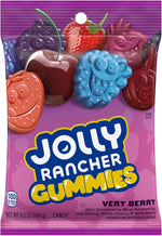 Assorted fruit-shaped chewy berry candies showing blue raspberry and wild strawberry shapes.