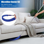 Cleaning underneath a sofa with the long handle duster