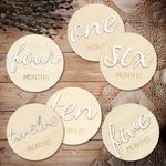 Eoscasely wooden baby monthly milestone marker discs front view showcasing premium three dimensional lettering.