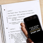 Five Star notebook opened to display reinforced pocket dividers