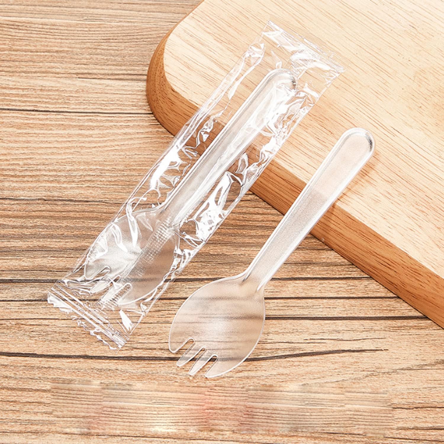 Jamogou clear disposable spork pack front view displaying individually wrapped utensils