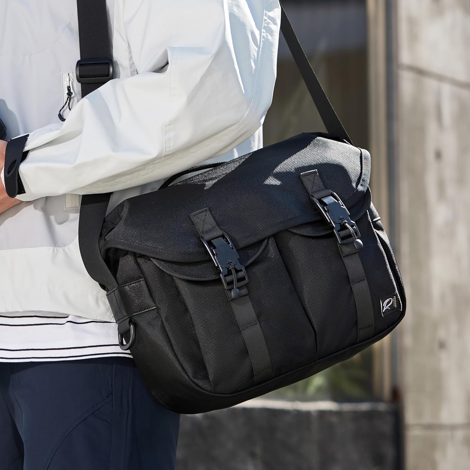 Padwa Lifestyle Black Camera Bag front view showing durable nylon flap and shoulder strap