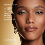 Estee Lauder Re-Nutriv Ultra Radiance foundation jar next to its custom angled application brush