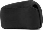 MegaGear travel camera case hanging from backpack