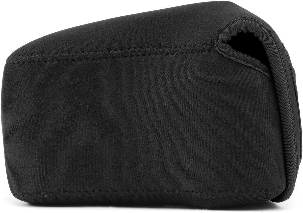 MegaGear travel camera case hanging from backpack