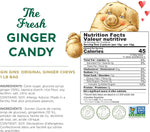 Individually wrapped healthy ginger candy pieces spilling out of the packaging.