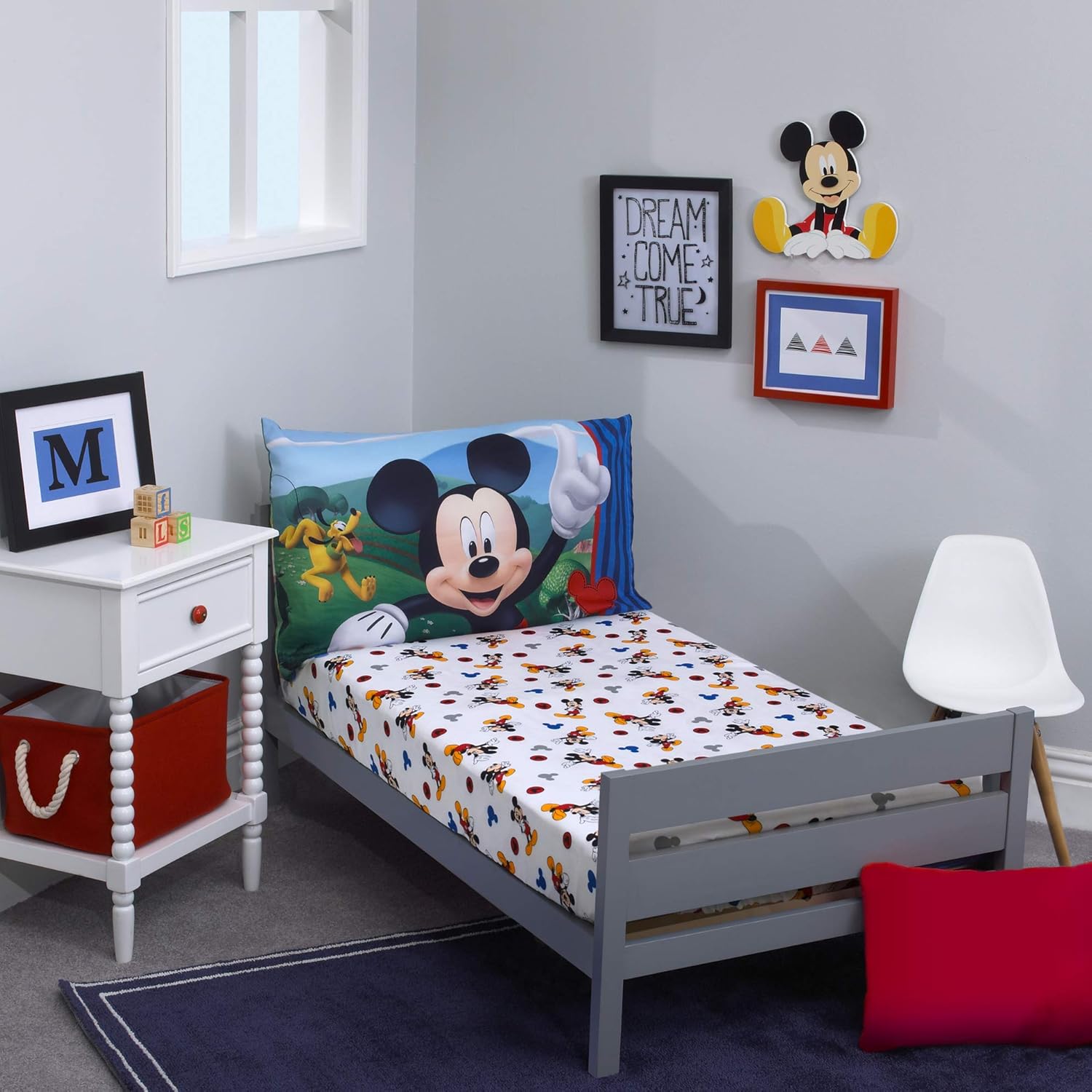 Disney Mickey Mouse toddler sheet set front view showing fitted crib sheet and reversible pillowcase