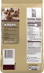 Individually gold foil wrapped Hershey's Kisses with almonds displayed outside the bag