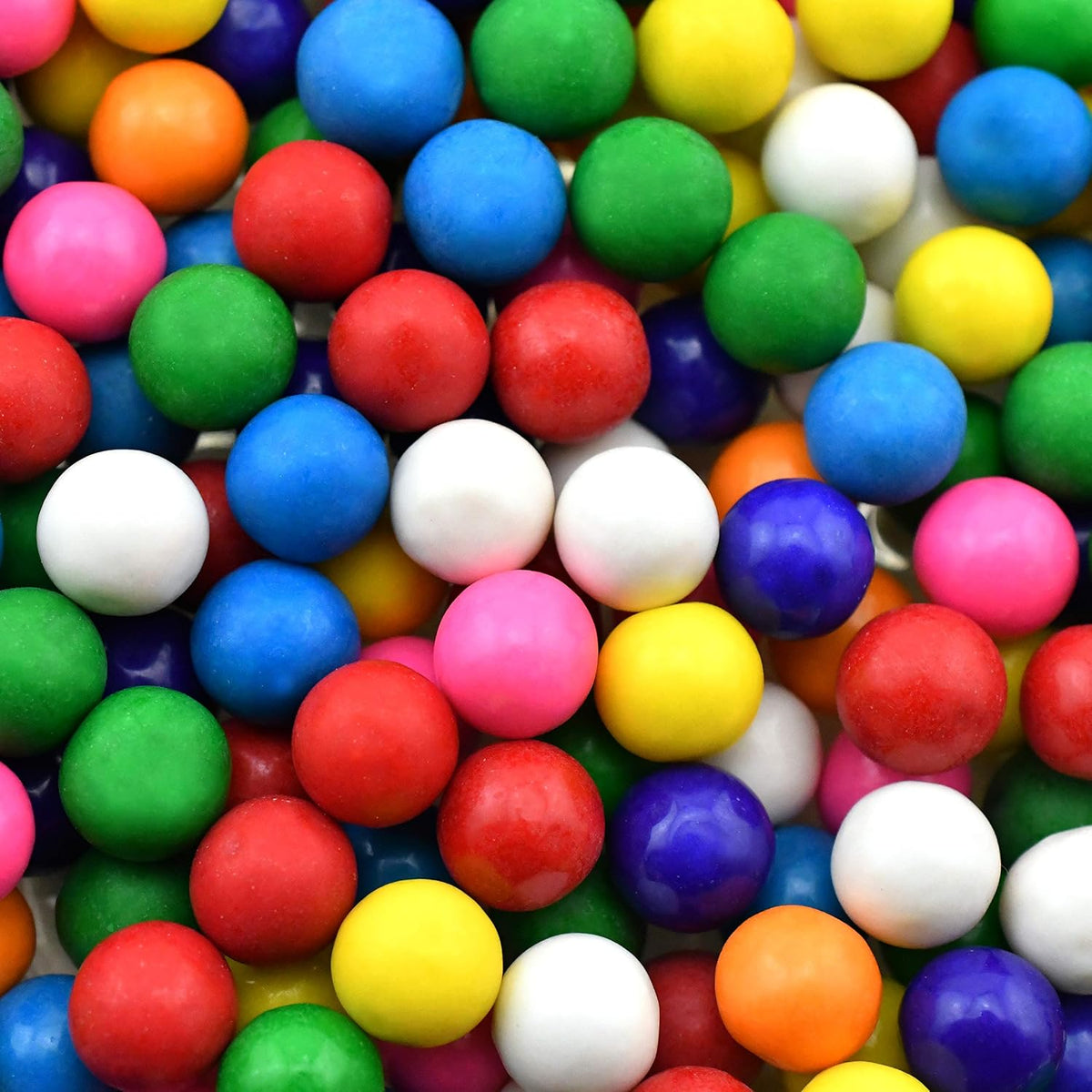 Colorful mini gumballs in a zero point six two five inch size for home candy machines.