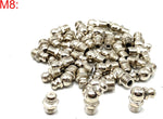 Close-up view of straight and angled metric grease nipples