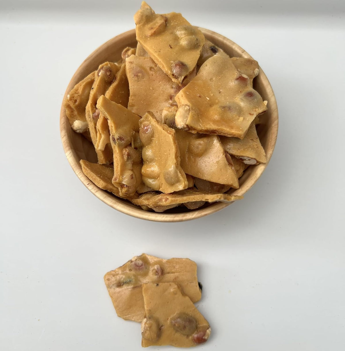 SweetNest Candy Homemade Recipe Premium Peanut Brittle front view packaging showcasing authentic USA imported hard sugar candy pieces