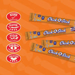 Atkinson Chick O Stick candy bar next to raw peanuts and shredded coconut ingredients