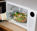Ove Glove lifestyle shot during outdoor grilling