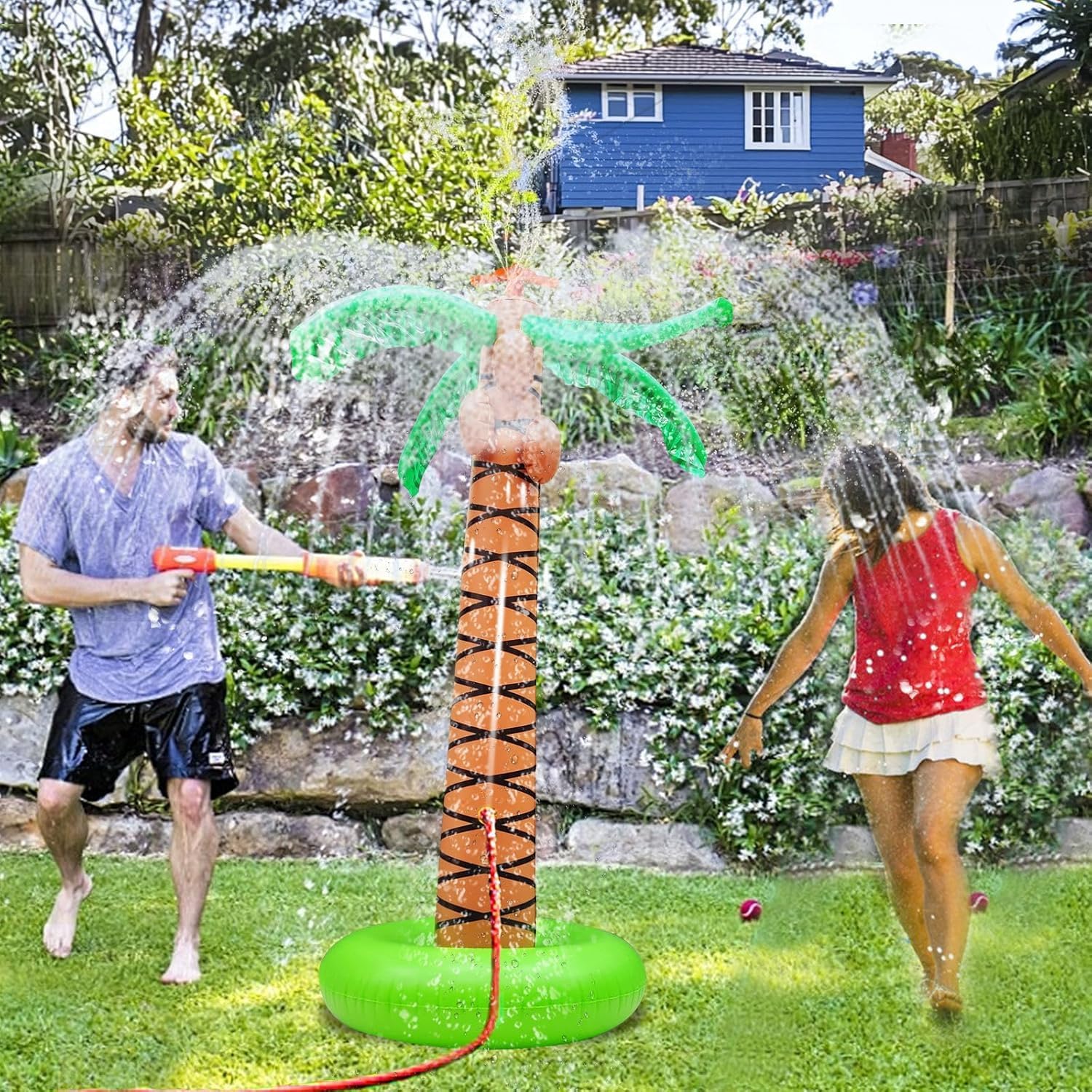 iGeeKid 61 inch inflatable palm tree backyard sprinkler front view on grass lawn
