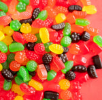 Wonka Jujyfruits nostalgic chewy candy bag being opened to show soft fresh gummies