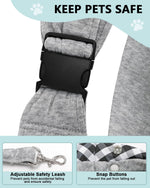 Gray pet travel sling showing secure safety harness latch