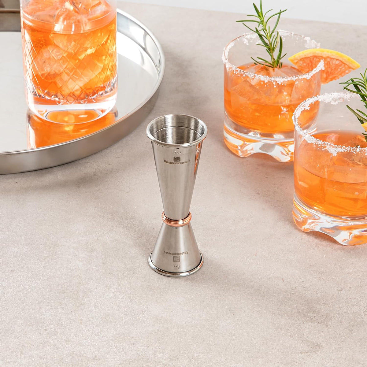 Restaurantware stainless steel cocktail jigger stable pedestal base