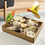 LOPERDEVE bird chewing toy box containing natural sola balls and rattan components.