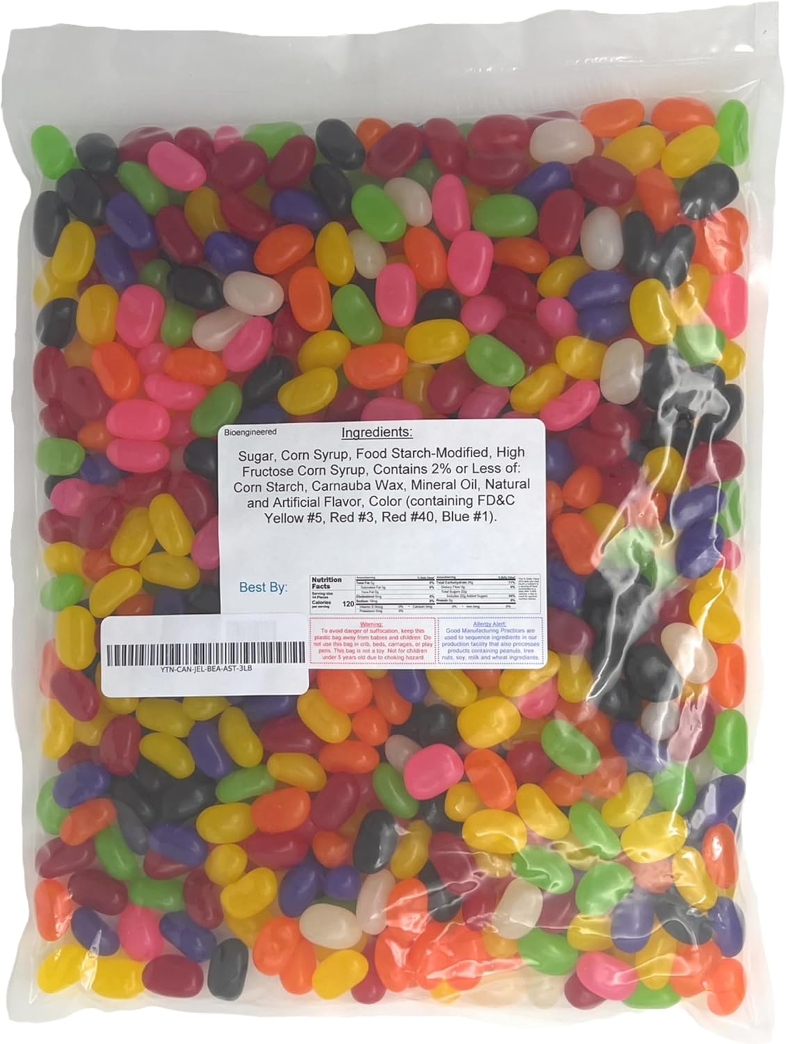 Mixed fruit and licorice flavored imported jelly beans spread on a clean surface