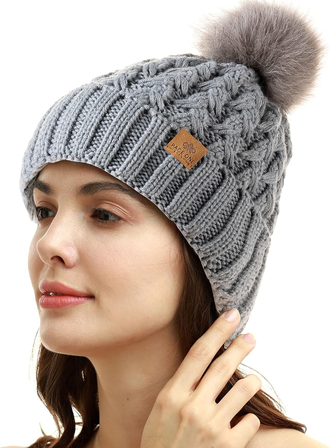 Page One Crossed Cap Cable Knit Side View Warm Winter Accessory