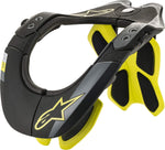 Alpinestars BNS Tech-2 neck support brace front view in black and yellow fluo colorway.