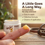 Product base of Happy Jack Onex showing manufacturing details and standard four ounce weight.