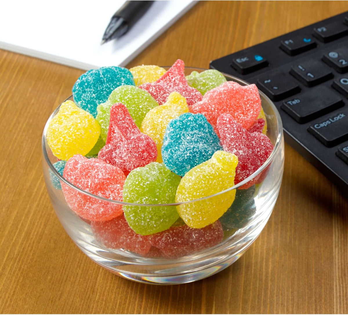 Blue raspberry and green apple sour gummy candy shapes