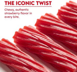 Individually wrapped strawberry licorice twists spilled out of the packaging for party favors