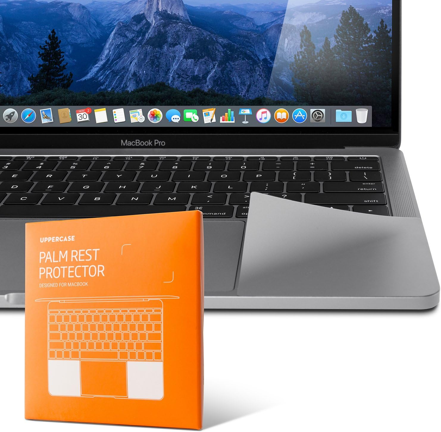 UPPERCASE premium palm rest protector set front view applied on a space grey laptop showing perfect color match alignment