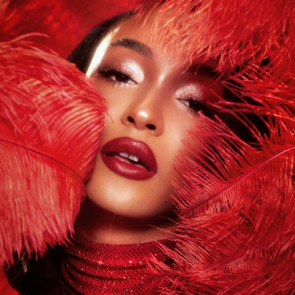 Charlotte Tilbury Cinematic Red long lasting moisturizing lipstick formulation texture display.
