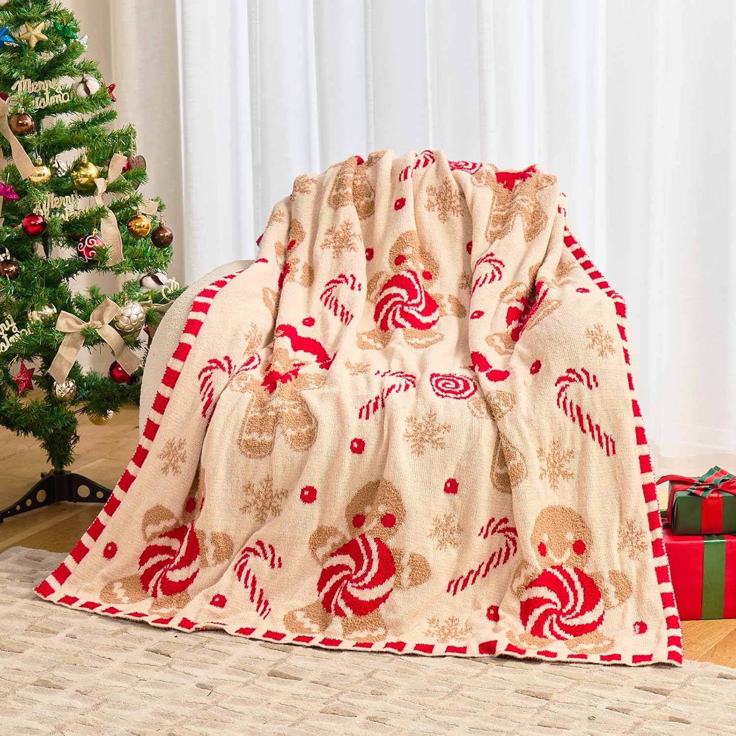 Nahjiiem gingerbread Christmas throw blanket front view showcased over a cozy living room sofa.