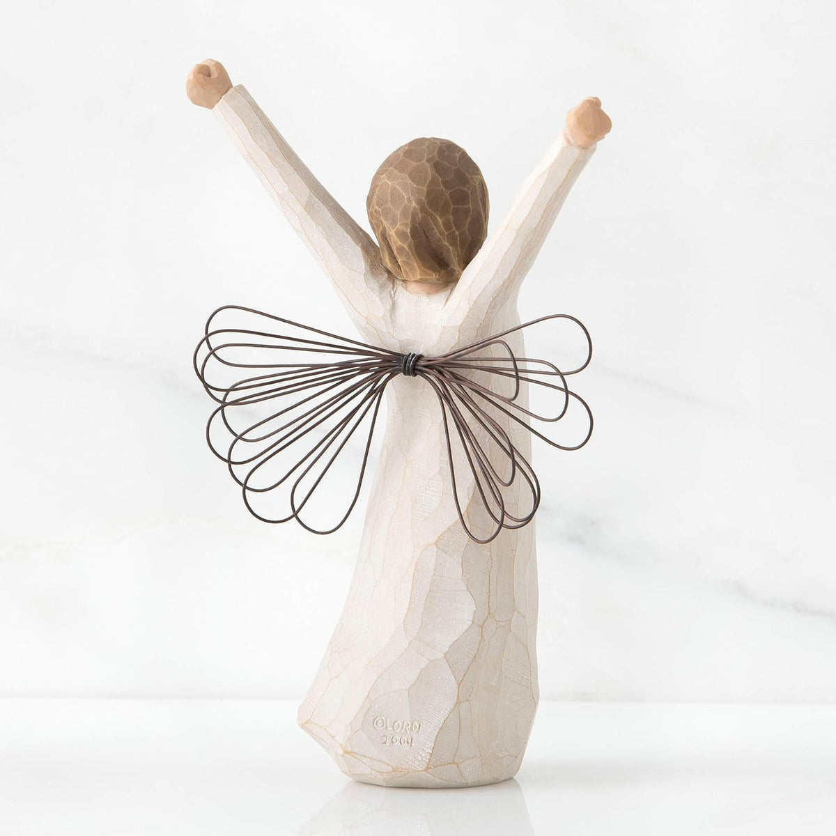 Willow Tree Courage Angel side profile showing wire wings