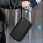 Tomtoc travel document organizer packed with travel essentials