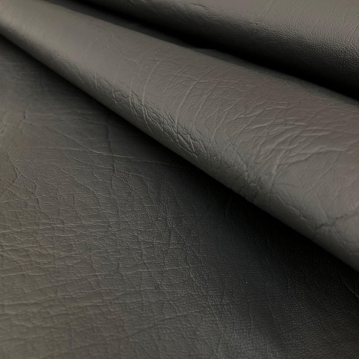 SARANDAVE embossed synthetic vinyl close-up texture view.