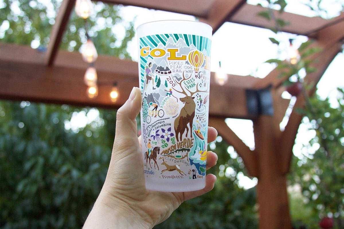 Catstudio frosted drinking glass featuring hand-drawn regional artwork