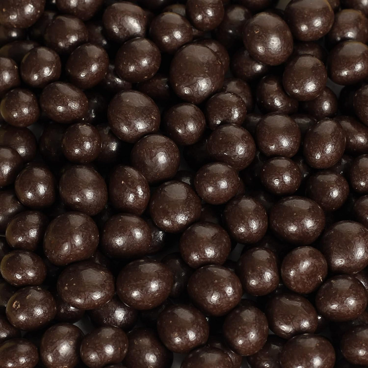Close up of dark chocolate covered blueberries snack