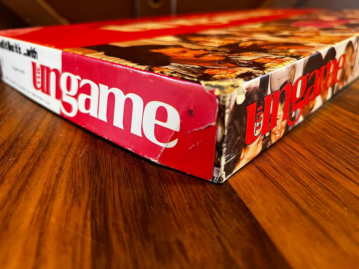 The Ungame colored movement pegs and die accessories