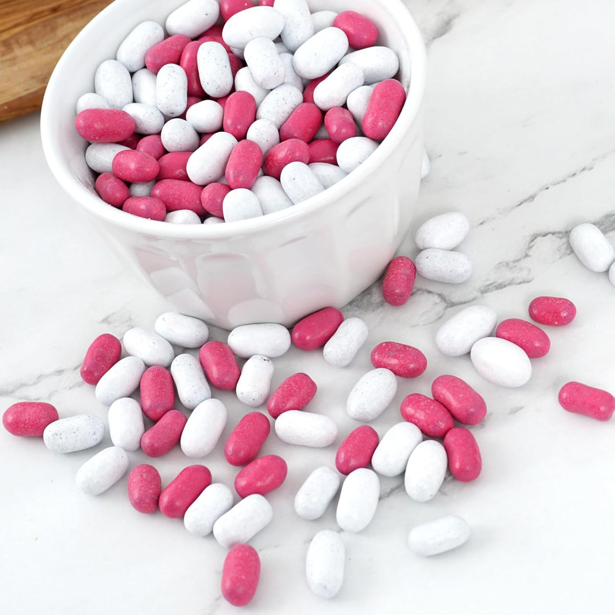 Classic American pink and white pill shaped licorice candies on display for party buffets.