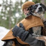 Side view of the heavy-duty 12-Ounce dog chore coat in Carhartt Brown.