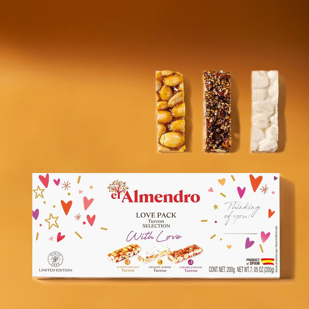 Assorted El Almendro traditional Spanish turron bars arranged to display the crunchy almond and caramel sesame textures.