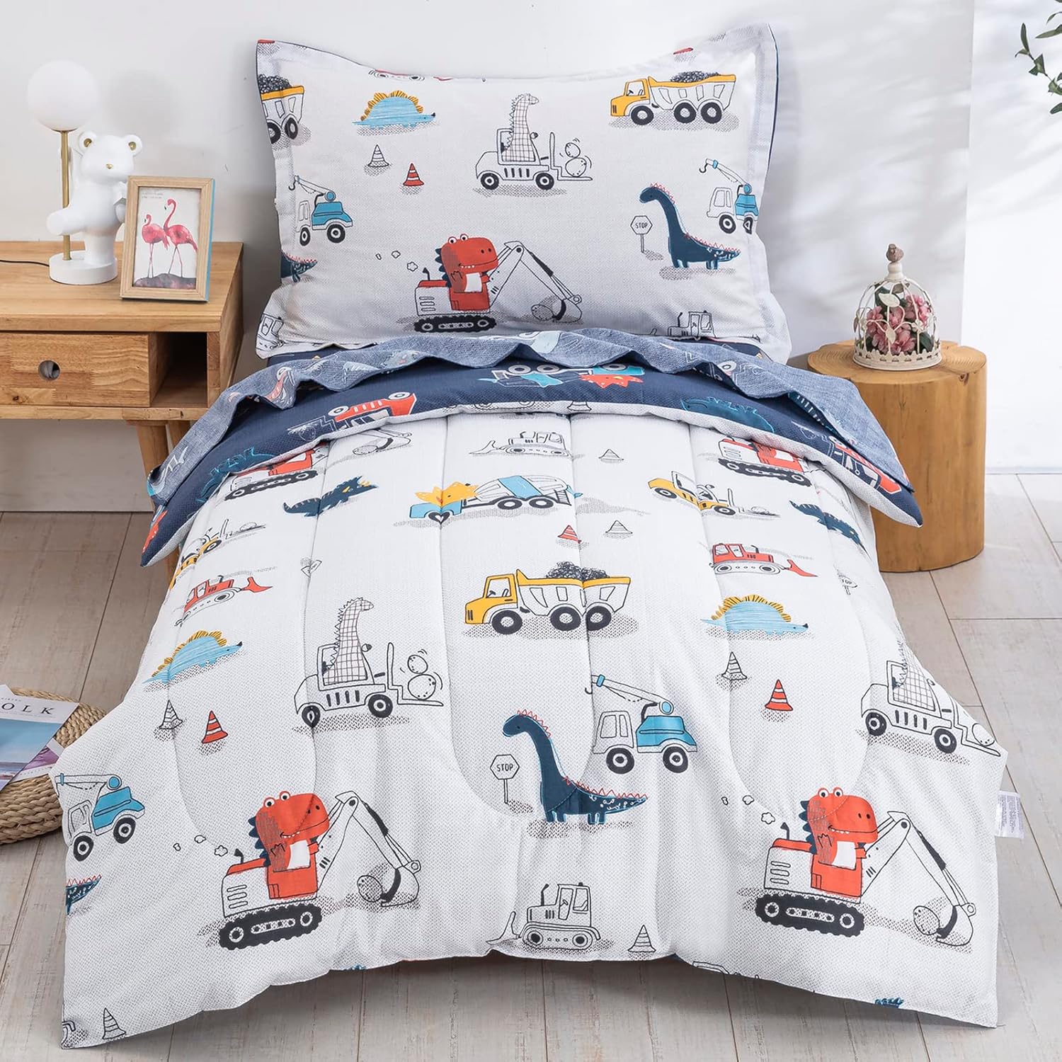 DJY 4 Pieces Cotton Toddler Bedding Set front view with dinosaur and car prints