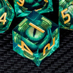 Close up of sharp edged resin dice liquid core